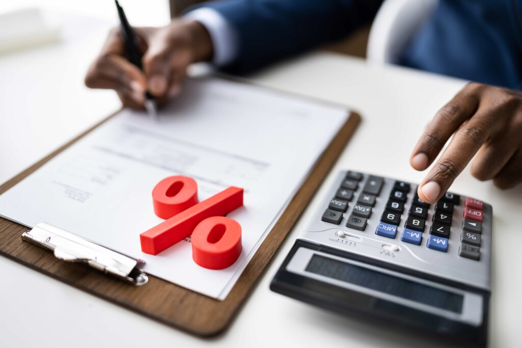 Man calculating interest on his savings